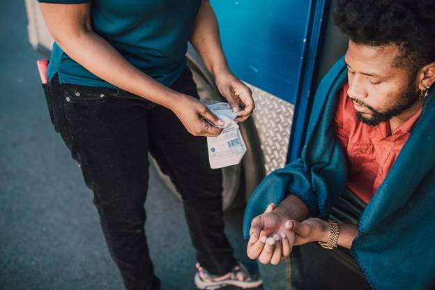 Man Holding his Hand From Injury