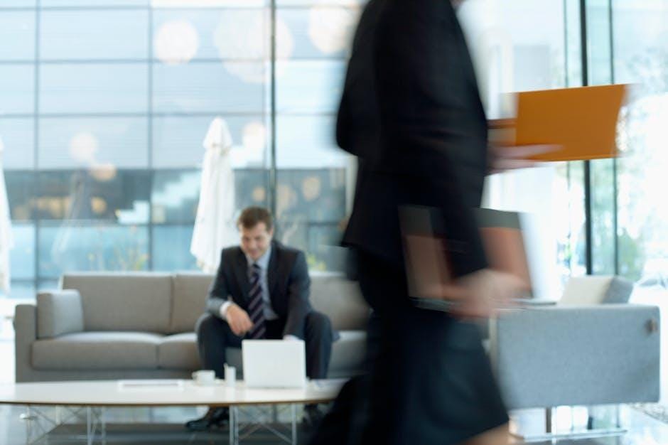 An IT executive reviewing strategy documents in a boardroom