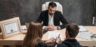 A specialist attorney consulting with a client in a professional office setting