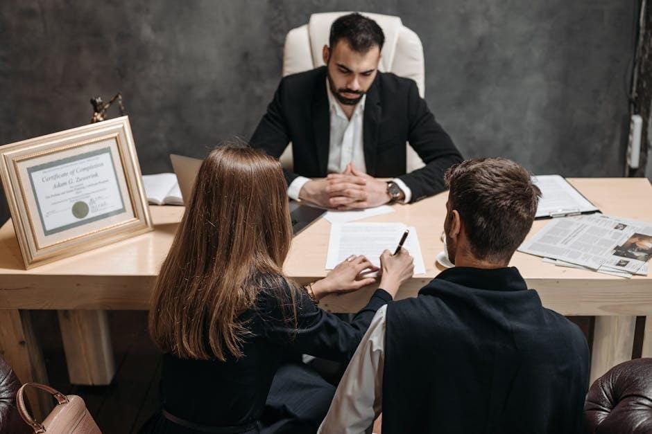 A specialist attorney consulting with a client in a professional office setting