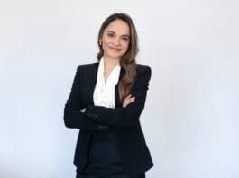 a woman in a black suit