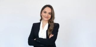 a woman in a black suit